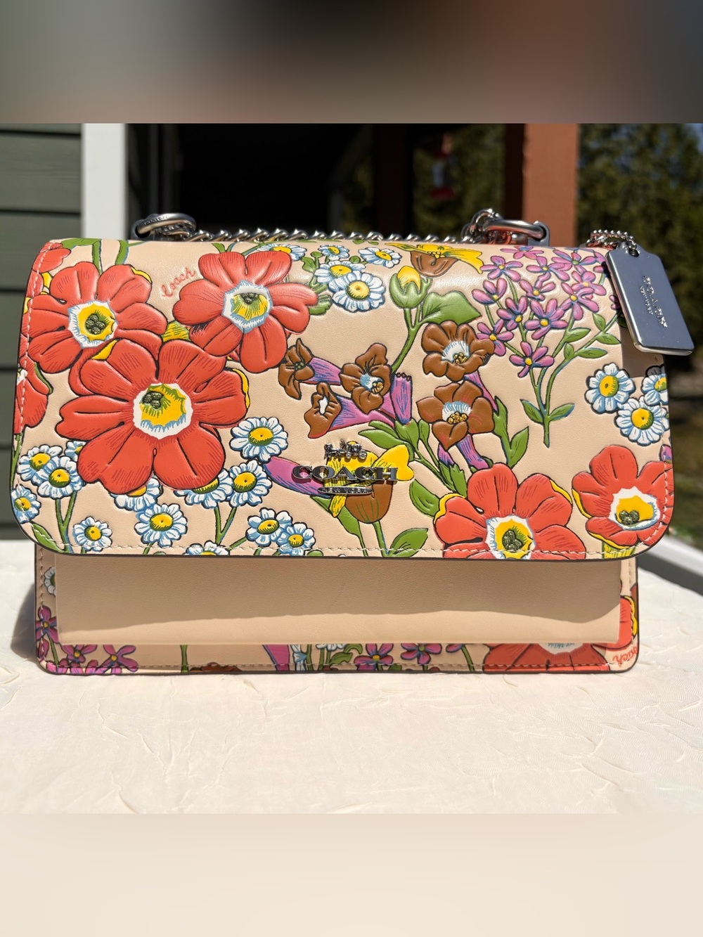 COACH Klare Crossbody Bag
With Embossed Floral Print CR163